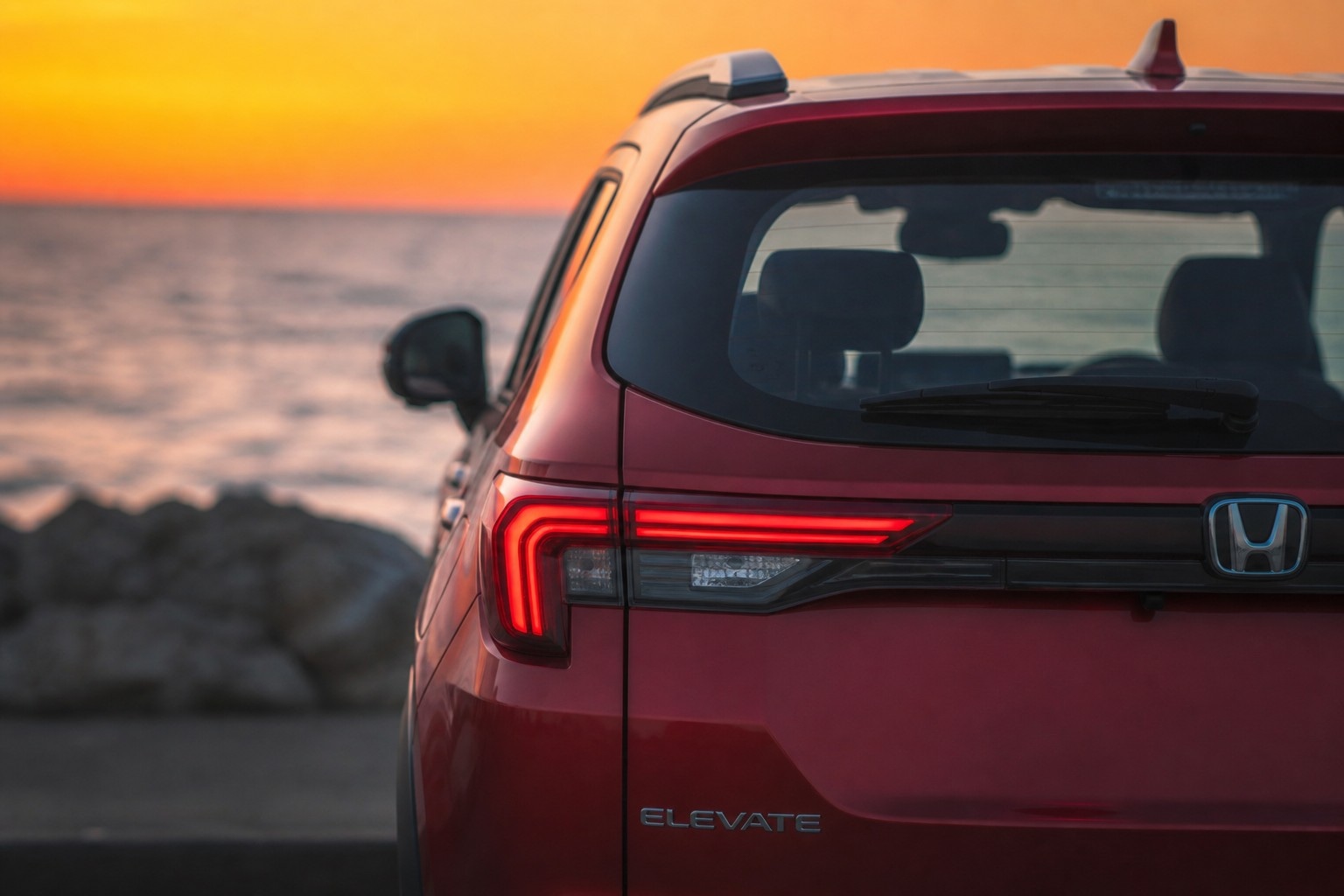 Honda Elevate at dusk, official rear three-quarter view